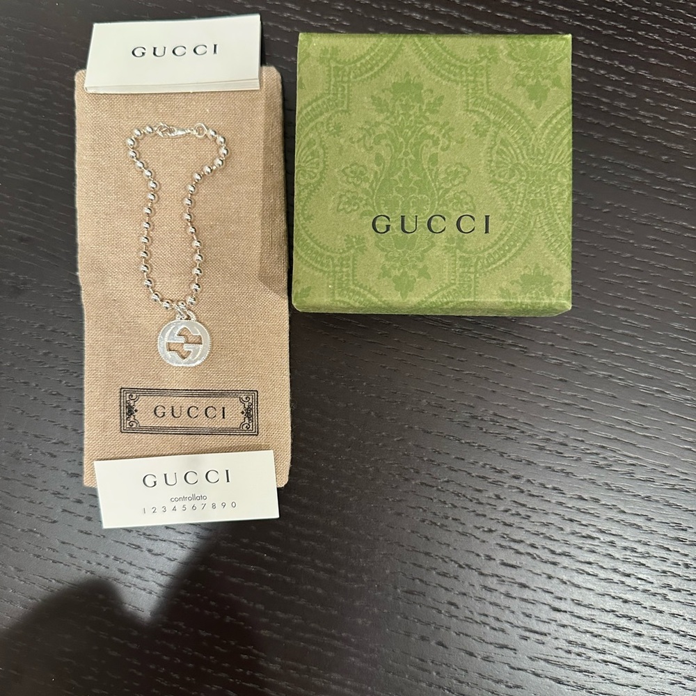 Gucci Silver Bracelet with Engraved Charm